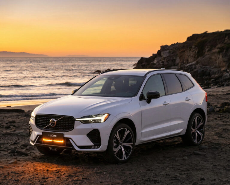 White Volvo XC60 with Luxtar Twilight in the grille at sunset